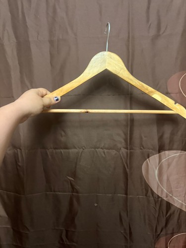 Used wooden clothes hanger - wooden,